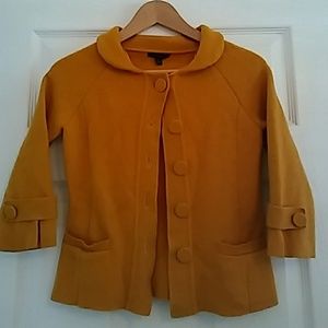 Blazer color is a (mustard)